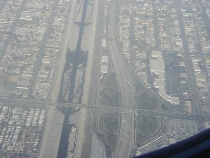 Stormwater canal and freeway interchange (Long Beach Fwy and Firestone Blvd) in LA<br>Location: <a href="https://www.google.com/maps/search/?api=1&query=33.94304,-118.17058" target="_new">Over California</a>